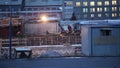 Workers at a construction site in the evening in the Russian city