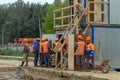 Group of workers at the construction site Royalty Free Stock Photo