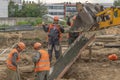 Workers at the construction site concrete foundation Royalty Free Stock Photo