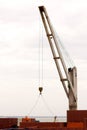 Workers, crane, containers in sea port