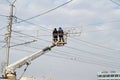 Workers on the crane install and decorate the Astrakhan bridge with led light in Volgograd