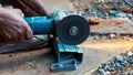 Workers are cutting steel pipes with fiber cutters in industrial work. Royalty Free Stock Photo