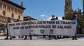 Workers demonstrate with banners in the Plaza del Pilar, Zaragoza. Spain