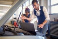 Workers detect problem with car in car service