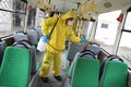 Workers disinfecting bus Royalty Free Stock Photo