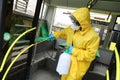 Workers disinfecting bus Royalty Free Stock Photo