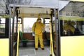 Workers disinfecting bus Royalty Free Stock Photo