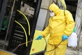 Workers disinfecting bus Royalty Free Stock Photo