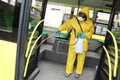 Workers disinfecting bus Royalty Free Stock Photo