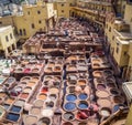 Workers are dyeing leather at the tannery in Fez, Fes el Bali Royalty Free Stock Photo