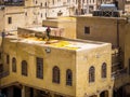 Workers are dyeing leather at the tannery in Fez, Fes el Bali Royalty Free Stock Photo