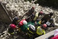 Workers in earthquake damage, Pescara del Tronto, Italy Royalty Free Stock Photo