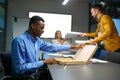 Workers eats pizza, business lunch in IT office