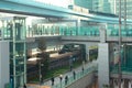 Workers and elelvated monorail in modern business and office area in Tokyo, Japan Royalty Free Stock Photo