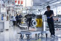 Workers at engine assembly plant