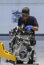 Workers at engine assembly plant