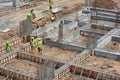 Workers fabricating ground beam reinforcement bar Royalty Free Stock Photo
