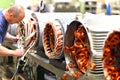 Workers in a factory assemble electric motors Royalty Free Stock Photo