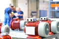 Workers in a factory assemble electric motors Royalty Free Stock Photo