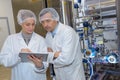 Workers in factory wearing hairnet Royalty Free Stock Photo