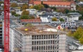 Workers fill the roof a a new builing with cement at a construction site