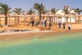 Workers fixing coastline of tropical resort near Hurghada