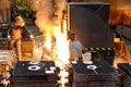 Workers in a foundry casting a metal workpiece - safety at work and teamwork Royalty Free Stock Photo