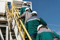 Workers go to the oil rig