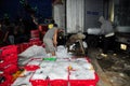 Workers are grinding ice to preserve tuna fish in the Hon Ro seaport, Nha Trang city