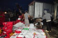 Workers are grinding ice to preserve tuna fish in the Hon Ro seaport, Nha Trang city