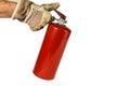 Workers hand holding an old fire extinguisher Royalty Free Stock Photo