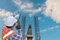 Workers hand holding communication radio and finger target