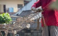 Workers hands put on gloves using hand to iron wire to tie for structure the house or building