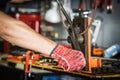 workers hands using with bending machine rebar for building equipment . selective focus Royalty Free Stock Photo