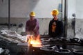 Workers are hard working in a foundry