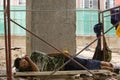 A workers have a break on a building site