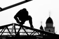 Workers high-builders build a roof Royalty Free Stock Photo