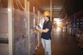 Workers Holding Barcode Sacanner The Checking Stock of Package Boxes. Storage Suppliers Warehouse. Inventory Management