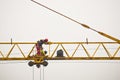 Workers inspecting and servicing a big construction crane in Belgrade