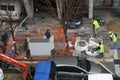 Workers install DSLAM fiber optics cabinet.