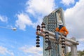 Workers install electrical equipment on new power poles. Royalty Free Stock Photo