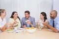 Workers laughing while enjoying lunch break Royalty Free Stock Photo