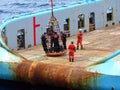 Transfer crews by personal basket from the platform to crews boat.