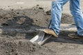 Workers and machinery are working paved road with asphalt and gravel, Street construction for land transportation, Road repair wor