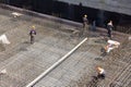 Workers make reinforcement for concrete foundation Royalty Free Stock Photo