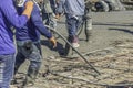 Workers man using a Vibration Machine for eliminate bubbles in concrete. after Pouring ready-mixed concrete. Royalty Free Stock Photo