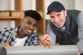 workers in manufacturing plant grinding to finish pipeline Royalty Free Stock Photo