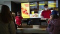 Workers in medical masks serve customers at McDonald`s restaurant during a virus epidemic. Minsk, Belarus - may, 2022