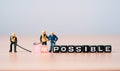 Workers men miniature figures use equipment dig to separate wording for change impossible to possible, mindset concept Royalty Free Stock Photo