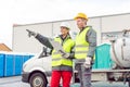 Workers in mobile toilet rental service